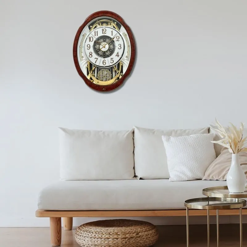 RHYTHM Stylish Brown Oval Shaped Woodgrain Wooden Case Melodies in Motion Hourly Chime Rotating Pendulum Showpiece Wall Clock for Living Room Home Decor Office Gifts (Size: 40.5 x 12.3 x 52.2 CM)