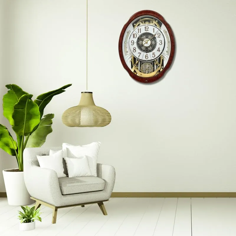 RHYTHM Stylish Brown Oval Shaped Woodgrain Wooden Case Melodies in Motion Hourly Chime Rotating Pendulum Showpiece Wall Clock for Living Room Home Decor Office Gifts (Size: 40.5 x 12.3 x 52.2 CM)